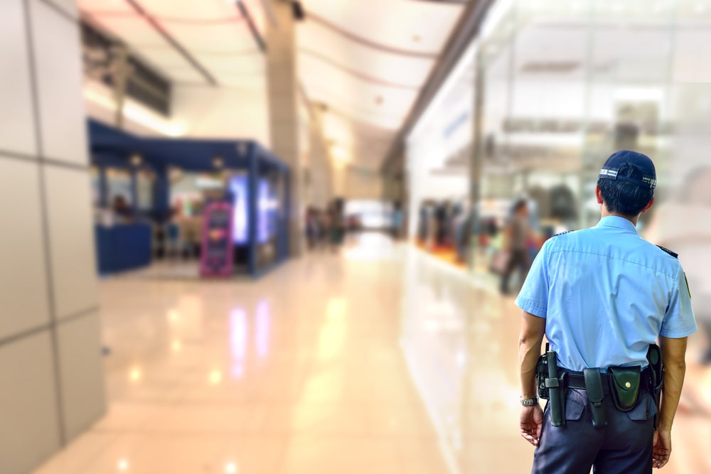 security guard walking in airport