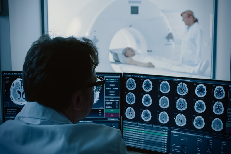 medical professionals reviewing imaging